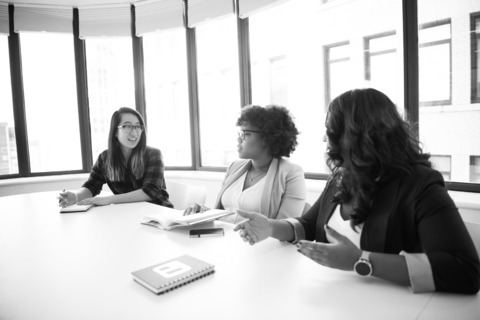 Three women Project discussing